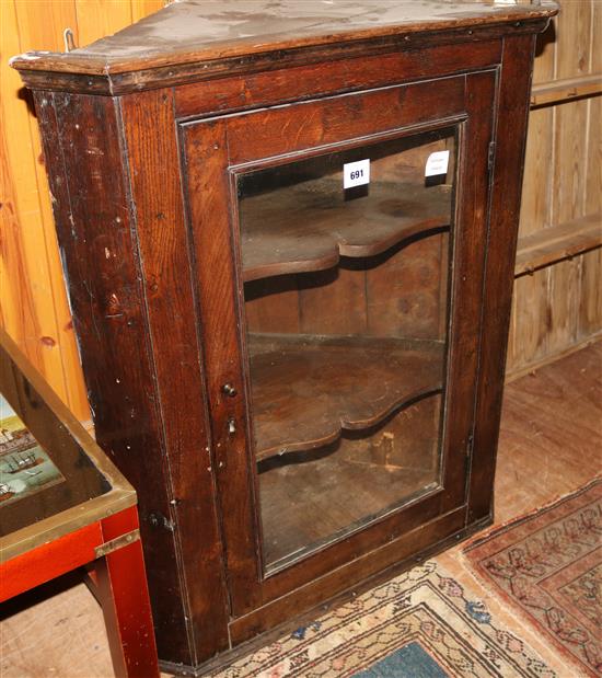 Oak glazed hanging corner cupboard(-)
